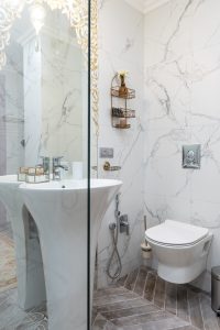 Vertical mirror fixtures for small powder room